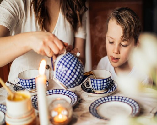 Family enjoying evening tea together
